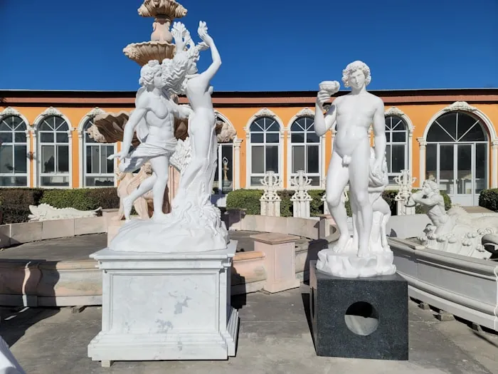 Marble figure groups displayed outdoors
